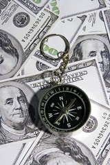 compass over money