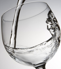 water pouring into a glass