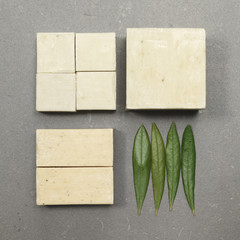hamman scenery : cubes of olive soap and olives leafs