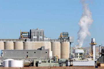 Obraz premium industrial building polluting air