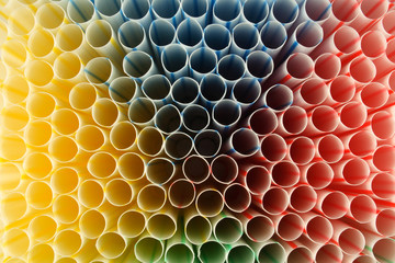 colorful abstract drink straws background.