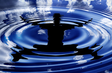 flying boy - water reflection