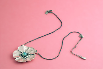silver flower petal shaped necklace