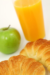 croissant, orange juice and green apple 03