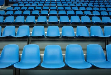 Fotobehang Stadion blauwe zittingen