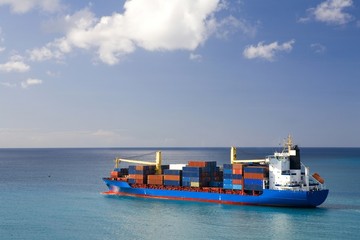 container ship at open sea - obrazy, fototapety, plakaty