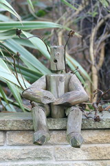 old wooden garden man
