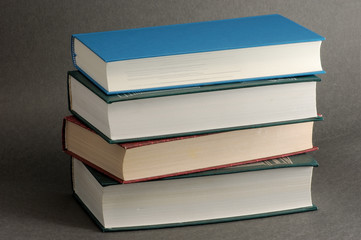 stack of books isolated on black