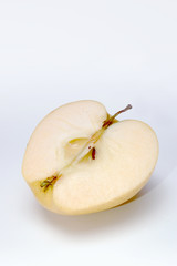 half of yellow apple