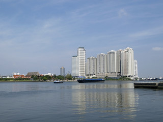 Obraz premium apartments by the river