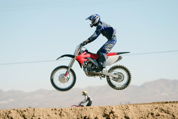 dirt bike jumping on the air