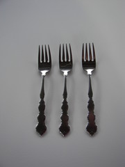 three salad forks