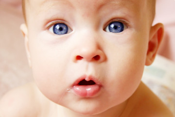 close up of babies face