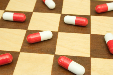 pills on chessboard