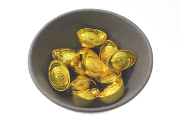 bowl of gold ingots
