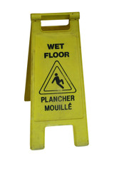 bilingual wet floor sign