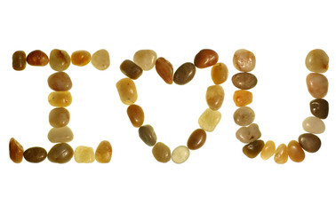“i love you” message written in polished pebbles f