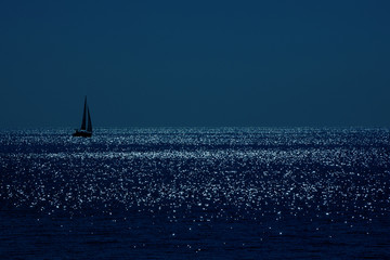 sailing under the moon