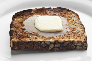 melting butter on toast