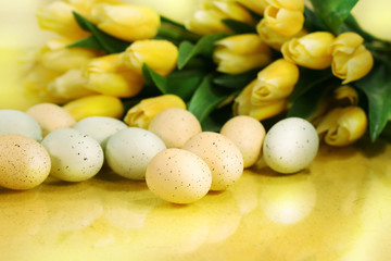 yellow tulips  and easter eggs