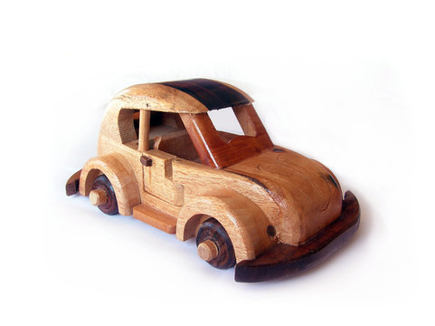 wooden car over white