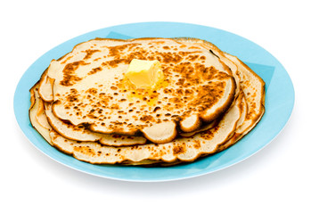 pancakes with piece of butter on a plate