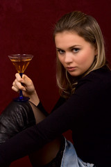 the fine girl with a glass in hands