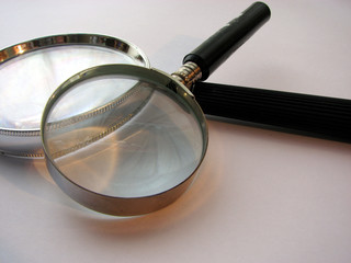 two magnifying glasses