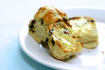 slices of freshly toasted hot cross buns