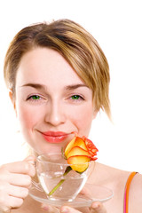 girl drinking a mineral water with rose