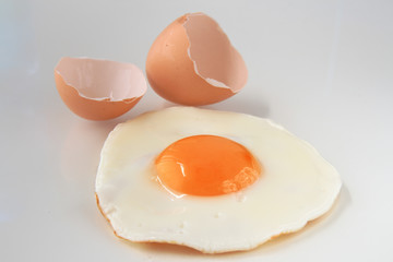 traditional fried egg with cracked shell