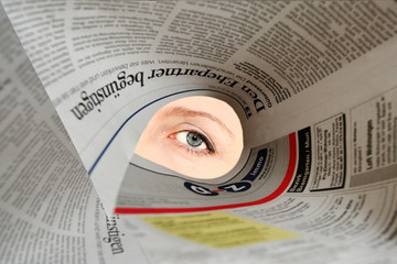 eye in a newspaper