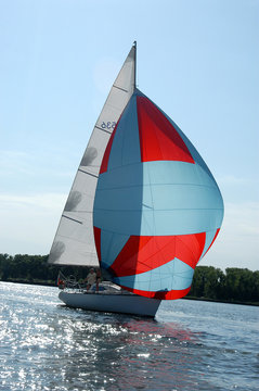 the yacht floats on the river