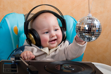 baby with disco ball