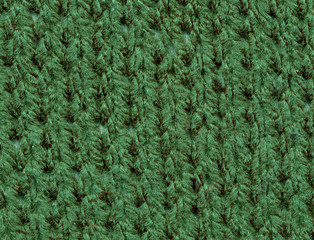 close up of green knitted wool.