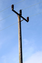 electricity pylon wooden pole and wires