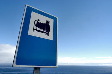 sign with figure of a photo camera