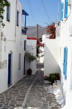 Fototapeta white and blue typical greek street