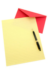 yellow letter paper and red envelope