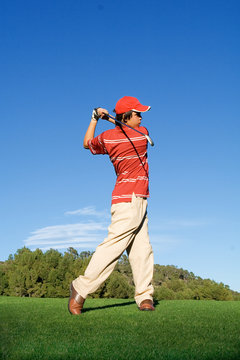 golfer playing golf
