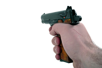 hand holding a pistol