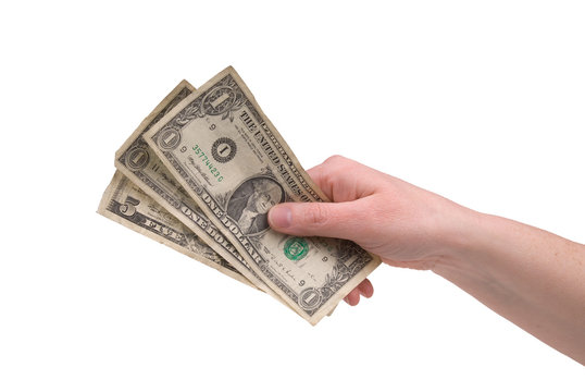 woman's hand holding money