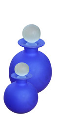 two glass round blue bottles