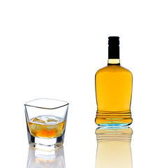 whiskey bottle and a whiskey glass