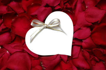 card on rose petals