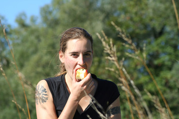 lady eating apple