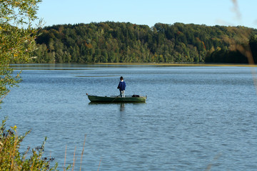 fisherman on lake