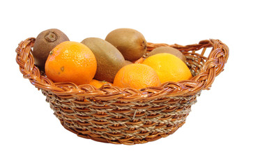 orange and kiwi in basket over white background