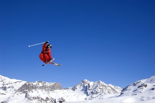 skier jumping high in the air