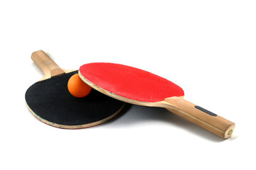 ping pong paddles and a ping pong ball